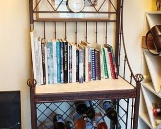 $250 Wrought iron baker's rack with travertine top. Other items in picture are not for sale.