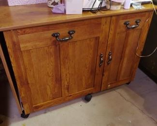 SEWING CABINET WITH FOLD DOWN EXTENSION