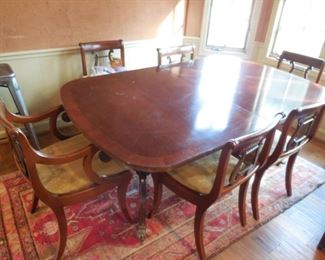 Table has two additional leaves. 