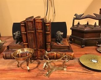 Many pairs of decorative bookends!