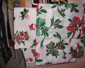 Two of several Christmas printed table cloths