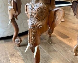 Quaint chinoiserie table with carved elephant detail and ivory tusks
