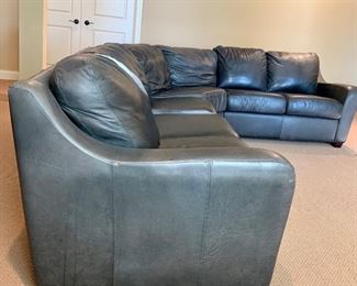 Side view of leather couch. Depth measures approximately 37”. 