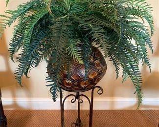 Faux plant on plant stand