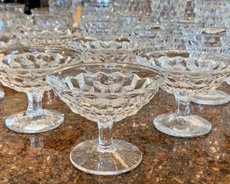 Collection of Fostoria American glassware.    Choose from coffee service, plates, glasses, and even a syrup pourer. 
