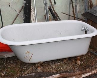 Antique iron bath tub with feet