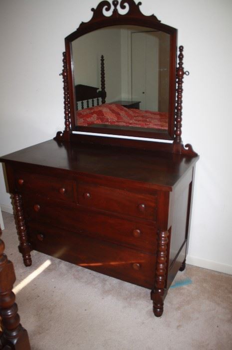 Beautiful cherry dresser with mirror.
