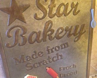 "Star Bakery" sign