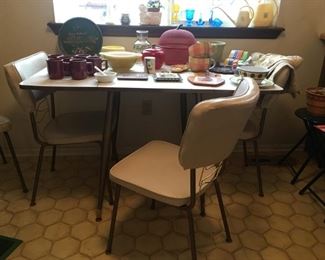 Mid century drop leaf table with Formica top and (4) chairs