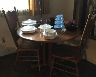 Oak round dining table & (2) chairs