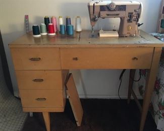 Singer sewing machine with parts
