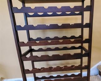 Wooden wine rack
Holds 48 bottles
45 inches tall
25 inches wide
10 inches deep $40