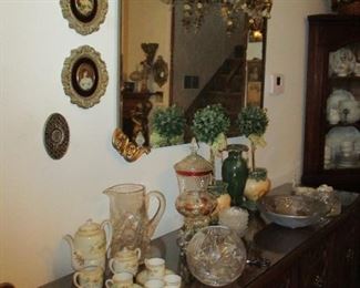 mirror over buffet with glass & china