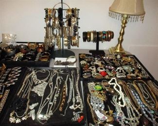 many bracelets & necklaces