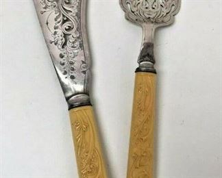 M003: ORNATE FORK AND KNIFE SERVING SET STAINLESS STEEL AND CELLULOID https://www.ebay.com/itm/123952007901