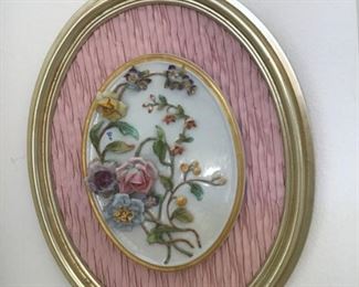 Pr. of  porcelain flower arrangements in oval gold gilt frames