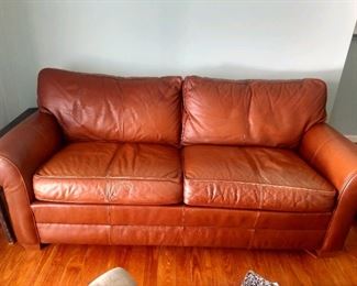 Leather Ethan Allen sleeper sofa
Down cushions