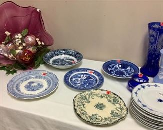 Exquisite hand-blown glass bowl (left) that can add elegance to any table or wall for display. Made at the renowned studio of Ira Sapir. Colors - dark pink and clear glass, accented with light blue and touches of gold. 