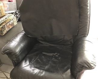 Swivel recliner with footstool.