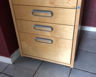 Four drawer rolling drawer unit in birch, two available. 
