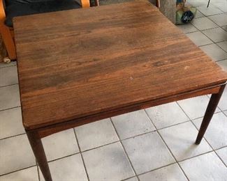 Danish modern teak Living room coffee table with pull out beverage tray.