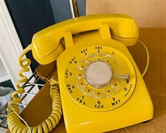 Western yellow rotary phone.