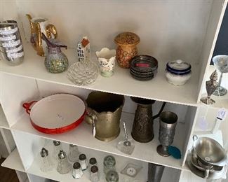 Salt, pepper, and sugar shakers, small decor items. 