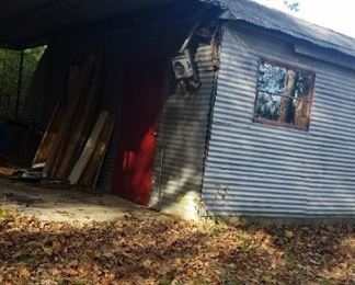 This building contains the 2 International Harvester Tractors and tools, and misc.