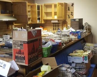 Cupboards and countertops full of housewares and kitchenware, dishes, pans and cookware, plastic storage containers, kitchen knives, flatware, glasses, holiday glasses, bakeware, rivets, hot pads, flatware and soup pots and more!