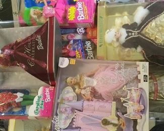 just a portion of about 100 new in box Barbie dolls.
