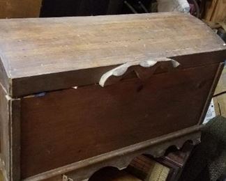 Camel back wood trunk, also 7 dressers or chests of drawers in outbuilding #1, bedroom suite, antique wood chairs, dining table, antique hutch, and so much more!