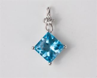 137: 14k Swiss Blue Topaz Diamond Pendant