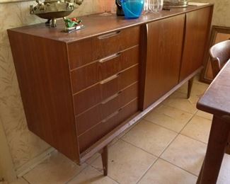 Danish modern dining table, 8 chairs, and buffet