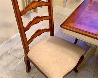 Ladder Back Dining Chairs with seats upholstered in cream 