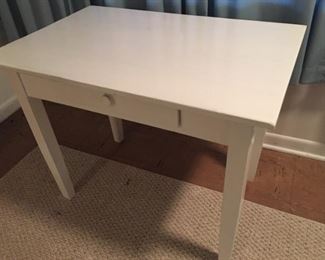 Small white table.