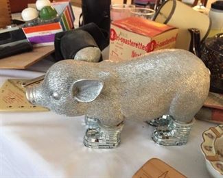 Silver Pig in Boots.