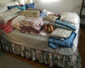 Assorted linens and queen mattress/box spring.