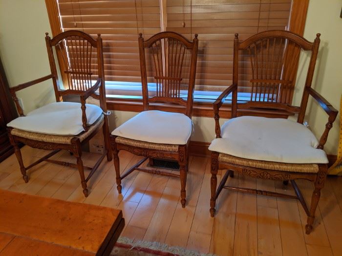 Sealed bid lot 002 eight rush seat dining chairs original retail price $900