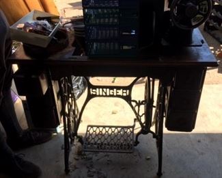 Antique Singer oak sewing cabinet.  $95.  Missing top, includes sewing machine