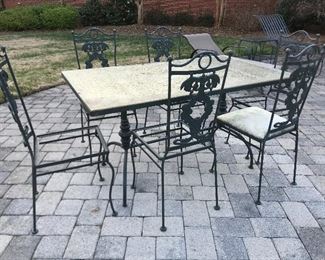 Glass top patio table and six chairs