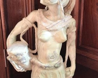 African jade sculpture titled “Woman Warrior” by Moses Chikumbirike, 16” tall