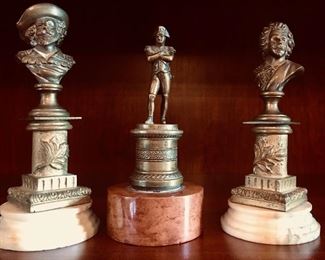 Small bronze busts on marble bases