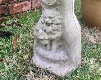 Cement pedestal with cat images