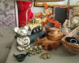 collectibles, tigger, elmo, small chalkboard, basket, trinkets