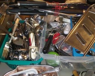 silverware, cutlery, cookking utensils, cheese grater, scissors, tongs, spoons, forks, knives