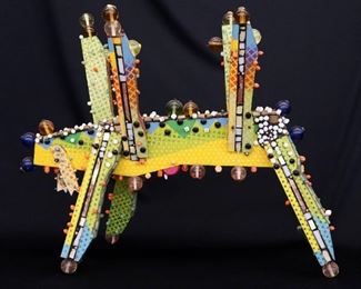 Sculpture. Mixed media sculpture of an untitled four-legged creature, which Kamrowski referred to as “Globs”. Multicolor painted wooden body with applied, beads, spheres, and tiles. Not signed, number "417". Some wear and replacement beads. Measures 28" x 36" high overall. Reference #K.9