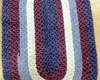 Multi Toned Oval Shaped Braided Rug