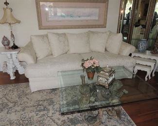 white brocade deep sofa. a few years old. Don't be afraid of white scotch guard yearly!