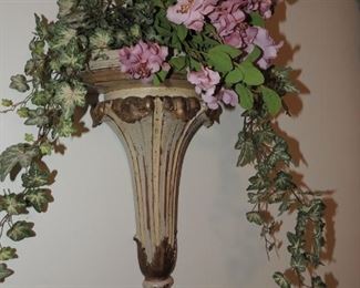 corbel shelf with floral arrangement