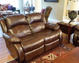 Leather loveseat with power recliners